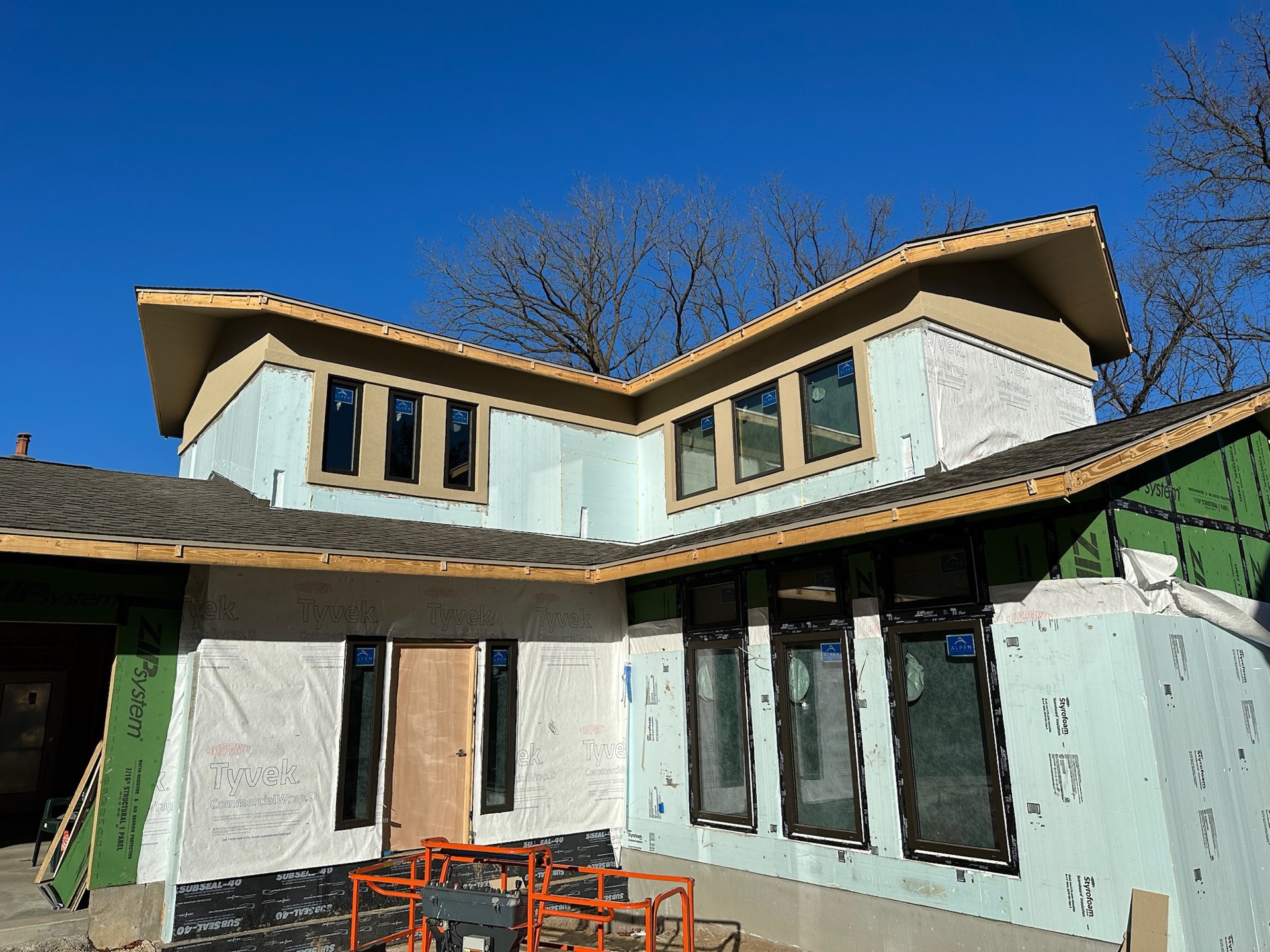 Modern angular luxury custom home under construction