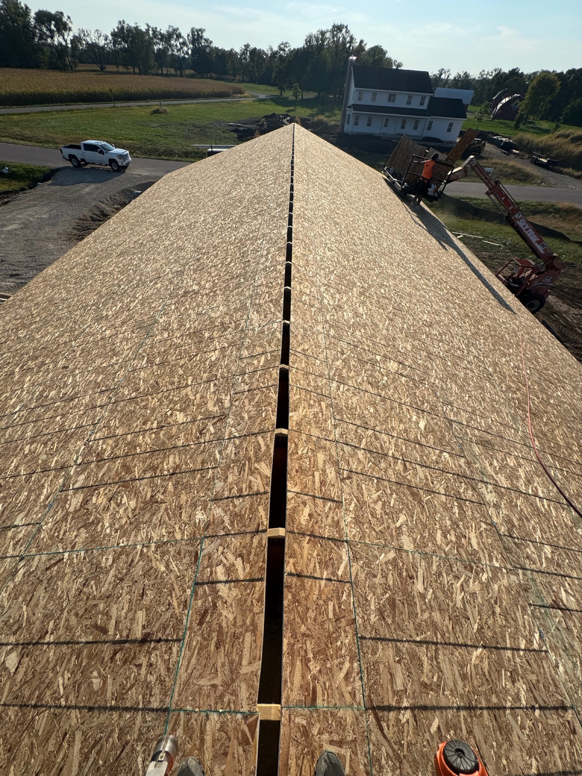 View from roof ridge of a large custom home build