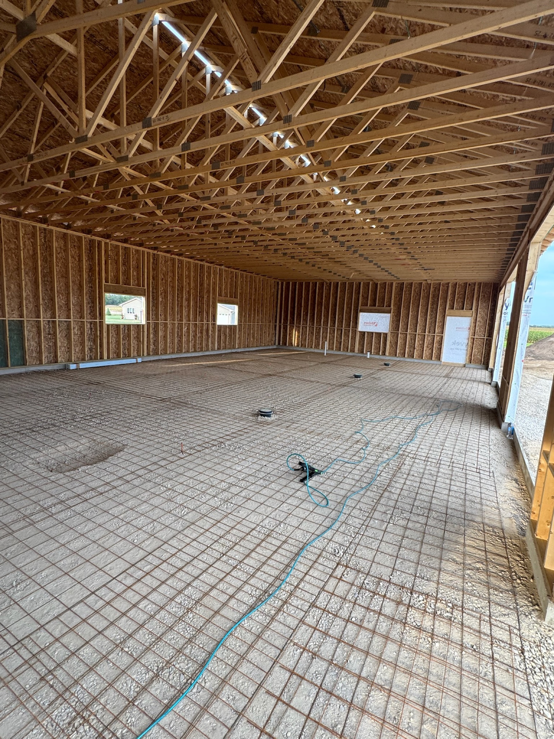 Massive interior with in-floor radiant heat prep — large luxury build