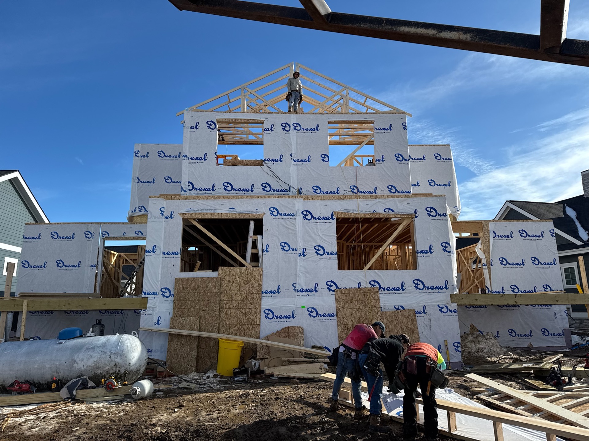 T.R. Grant Construction crew framing a luxury home