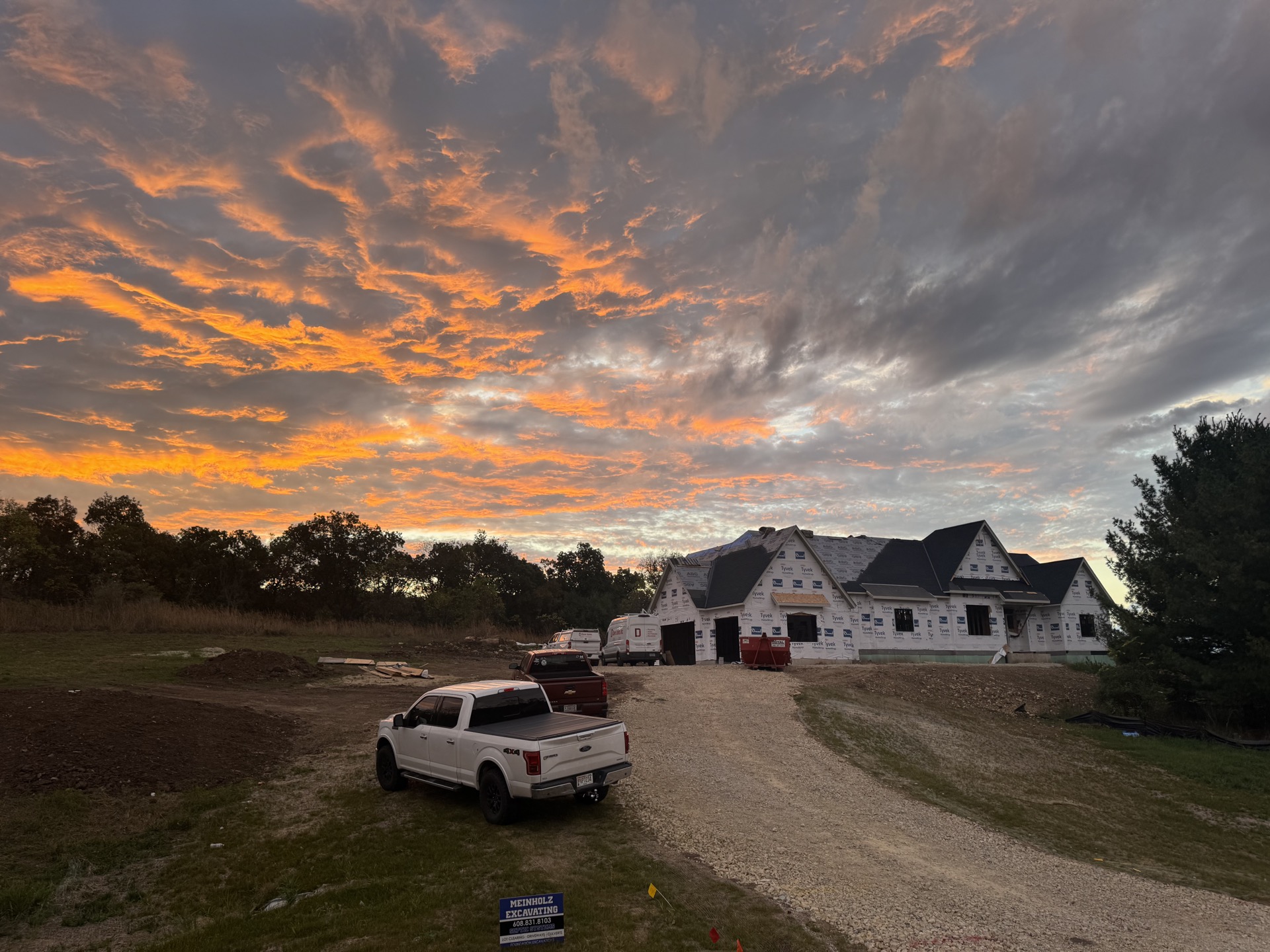 Golden hour at a luxury craftsman home under construction — T.R. Grant Construction